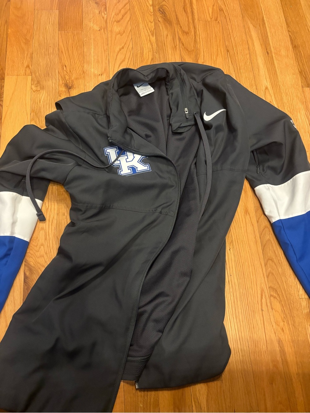 Nike Women's Black Hooded Bomber Jacket with Blue and White Sleeve Panels